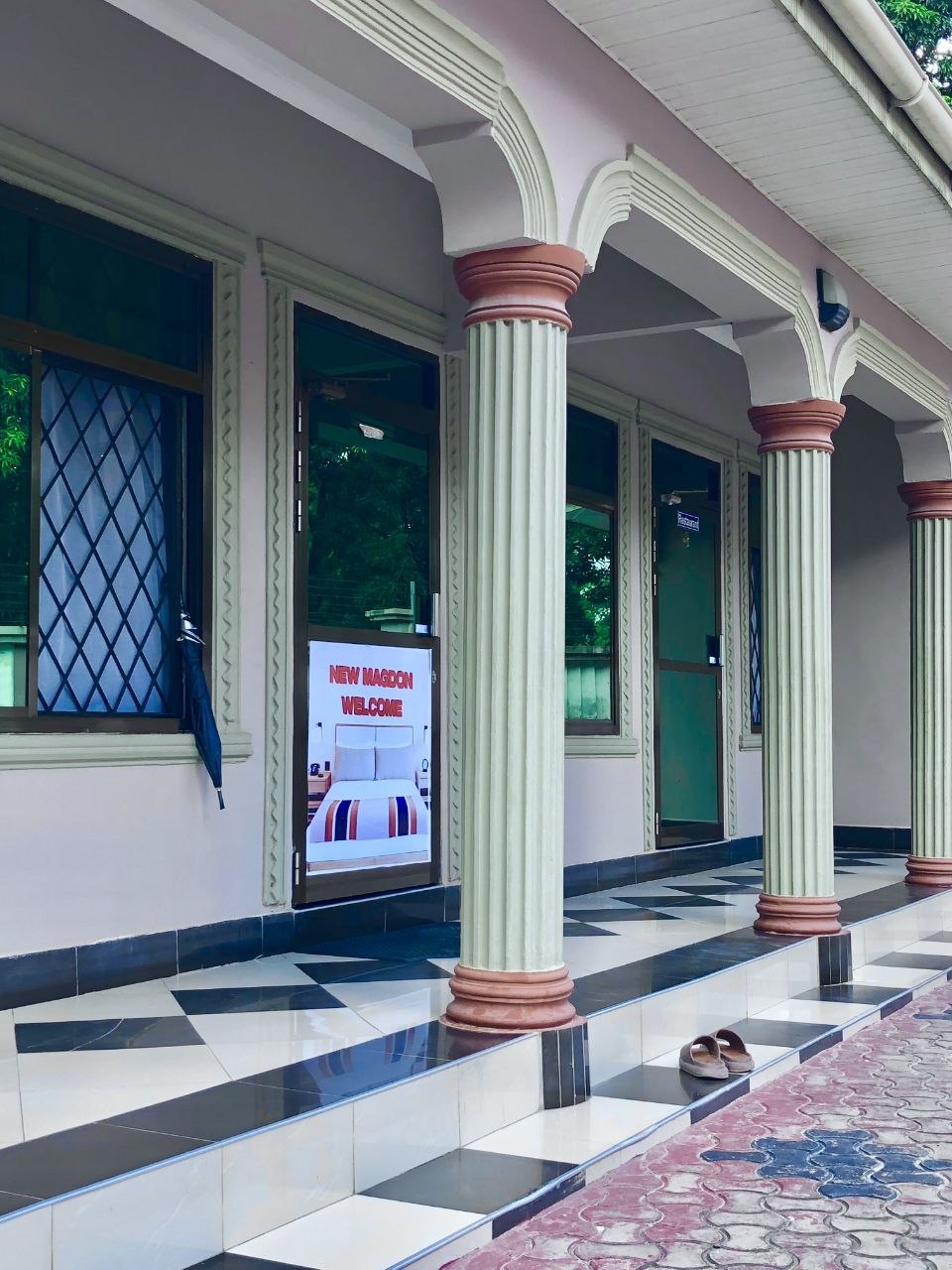 Magdon Lodge columned veranda walkway